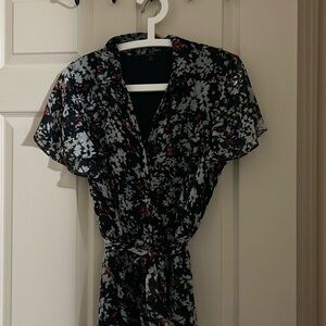 Cute floral dress for spring and summer . Polyester with lining .